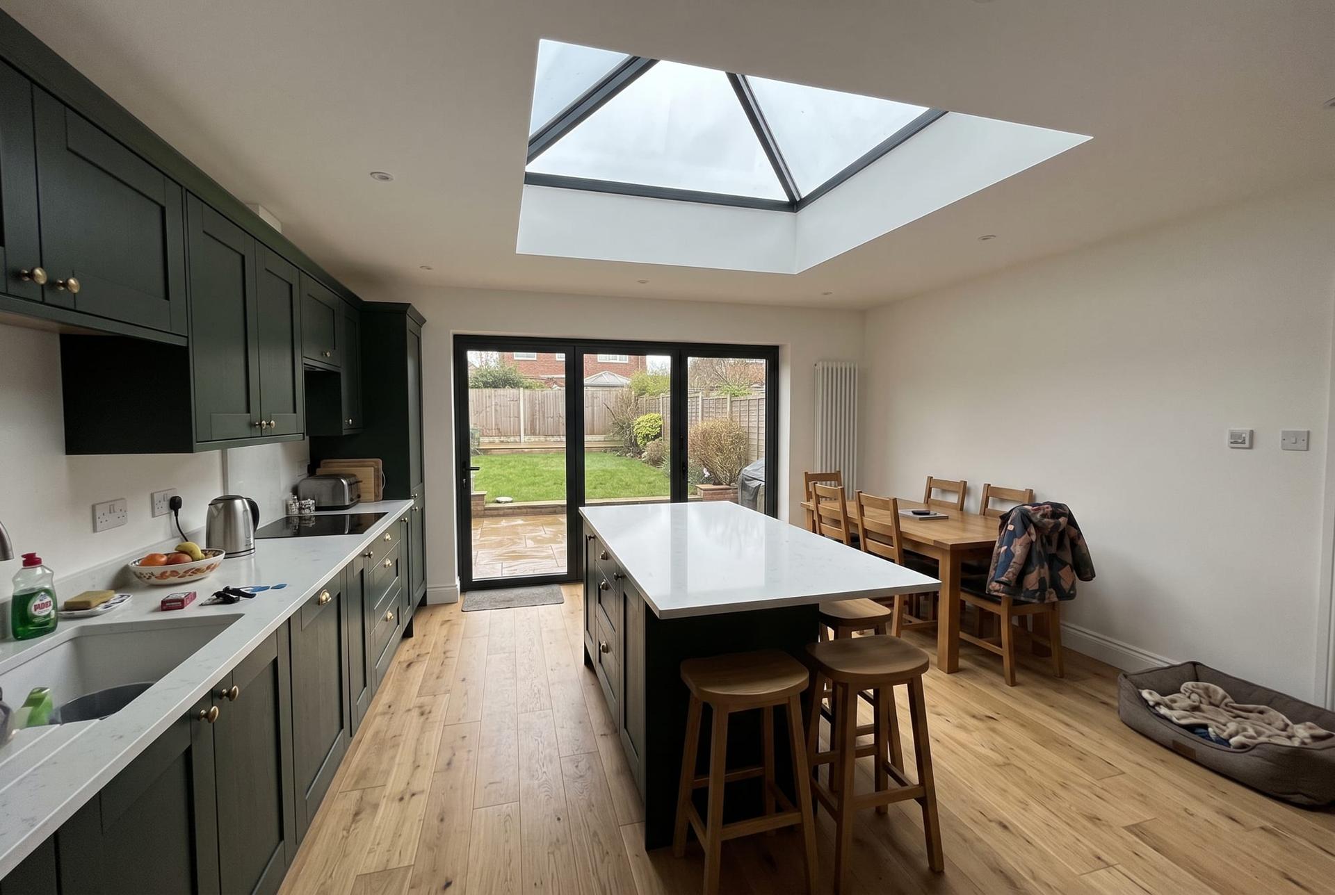 Open plan kitchen diner under a roof lantern