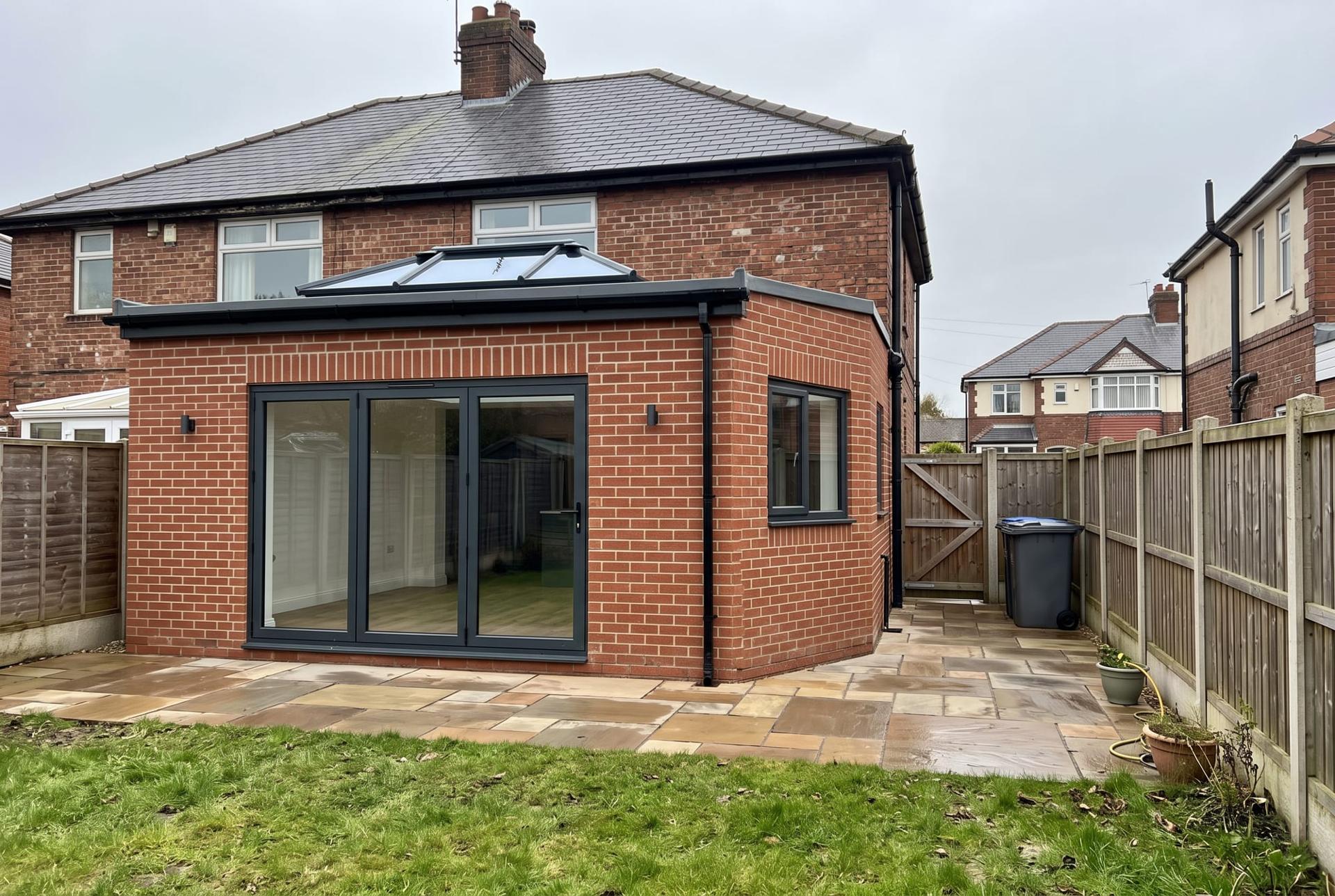 Rear extension with a roof lantern and bifolds