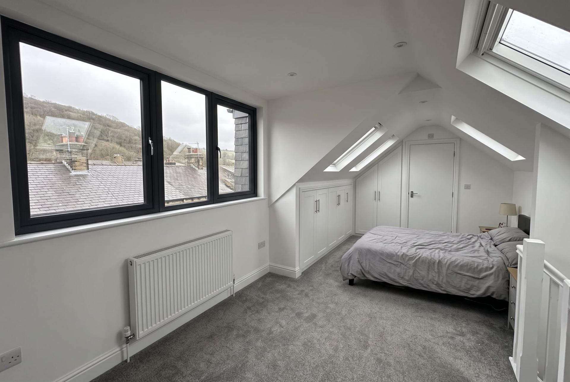 Loft bedroom with dormer window