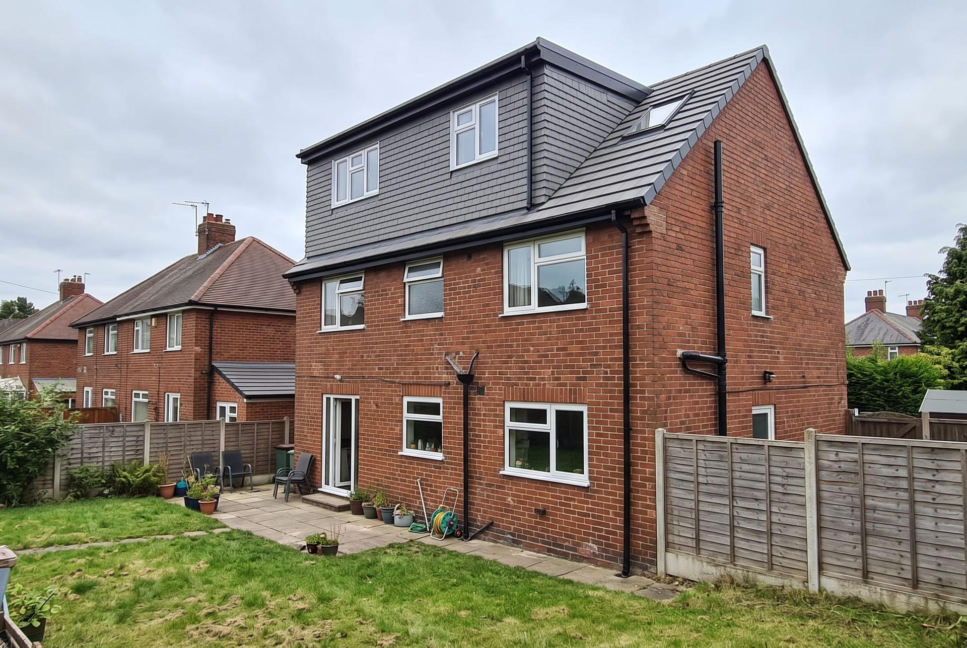 Hip to gable loft conversion on a brick semi